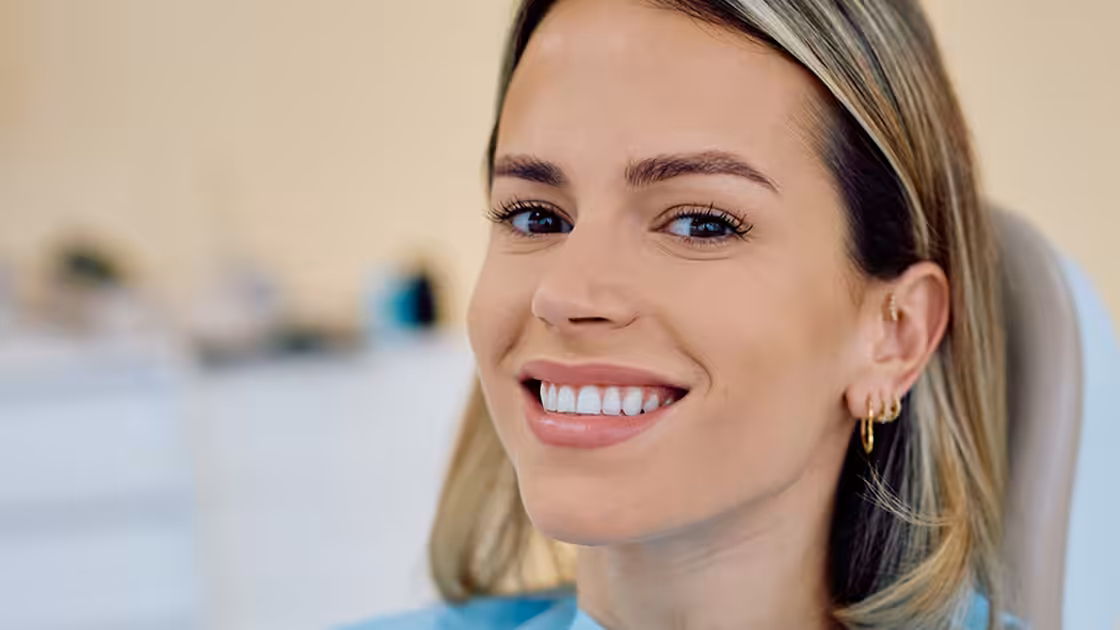 Smiling patient in yellow room photo